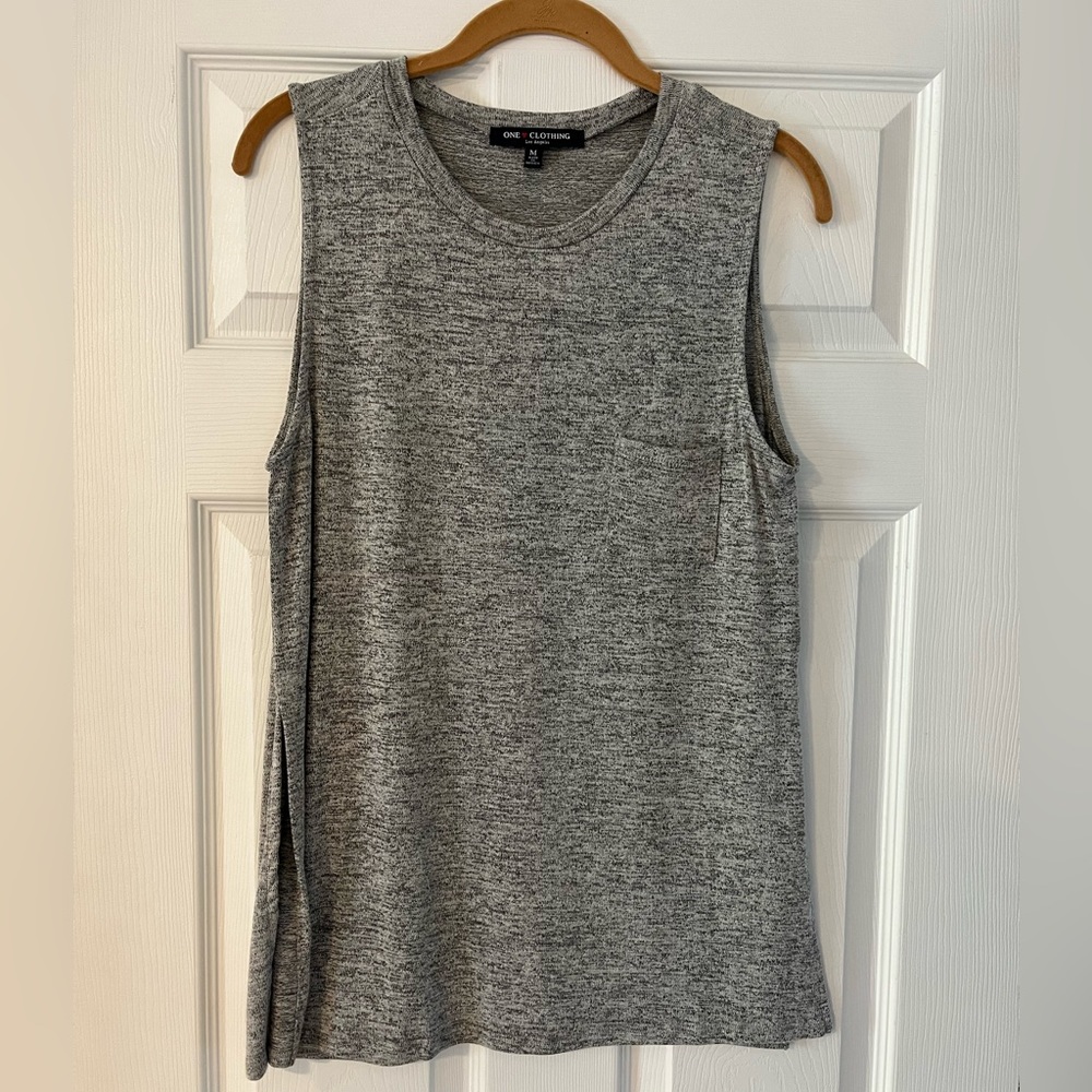 Grey, sleeveless top, side slits